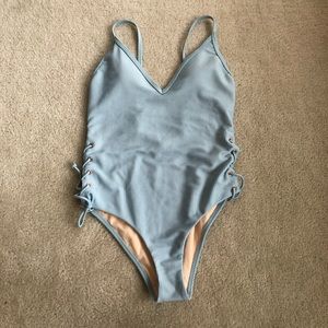 Light blue one piece swimsuit with drawstring side